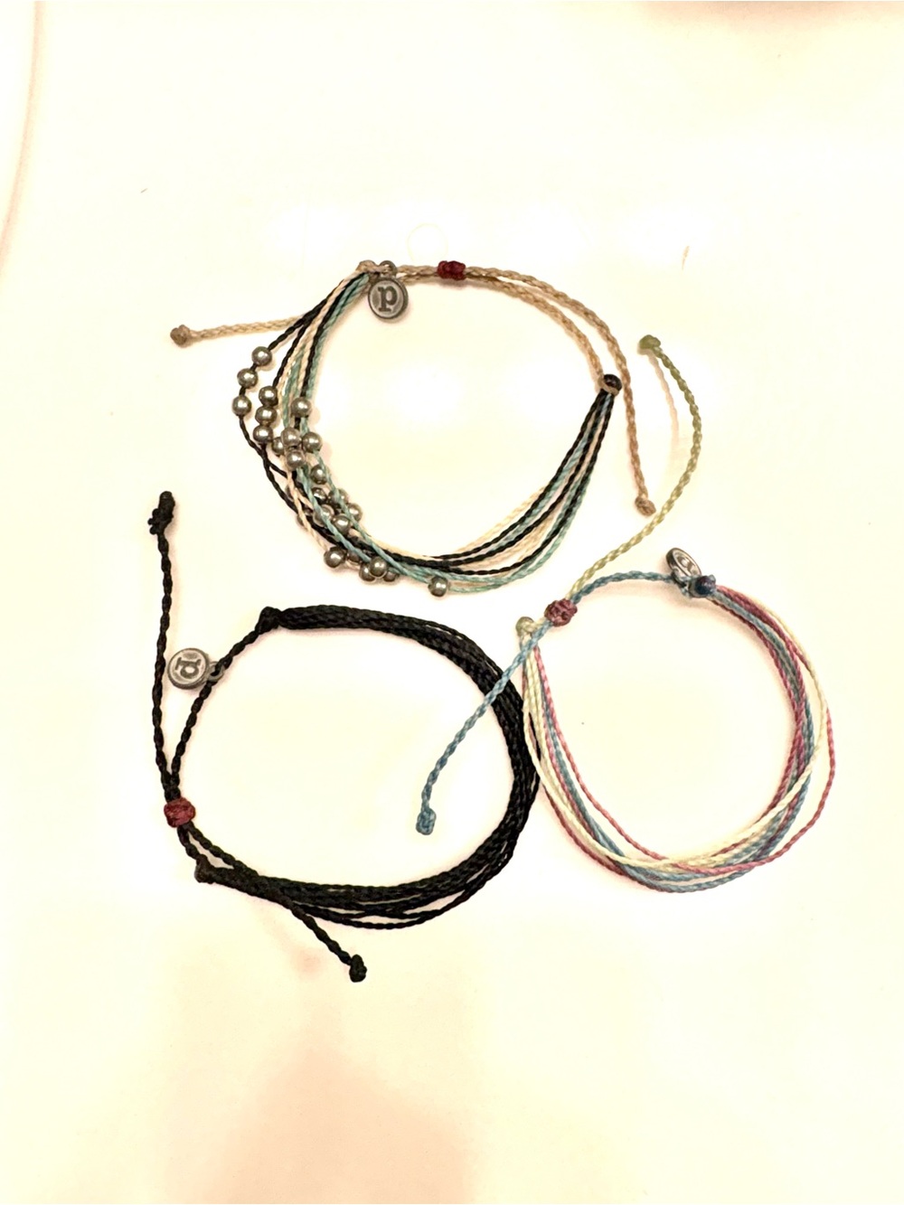 3 Pura Vida multi string bracelets